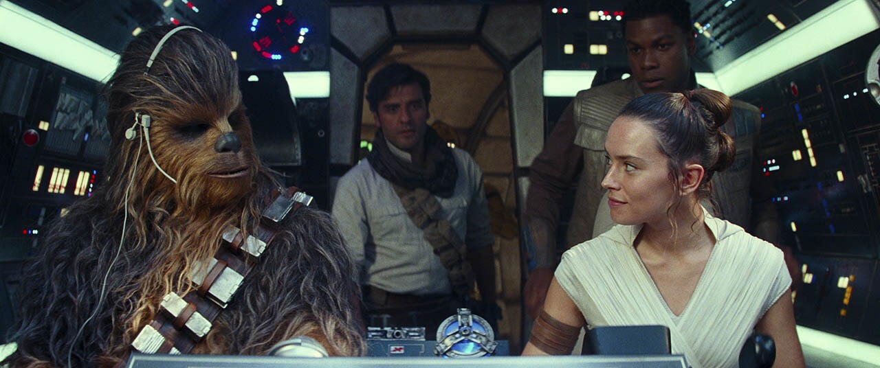 Chewbacca im Cockpit des Millennium Falken mit bernsteinfarbenem Hologramm-Effekt